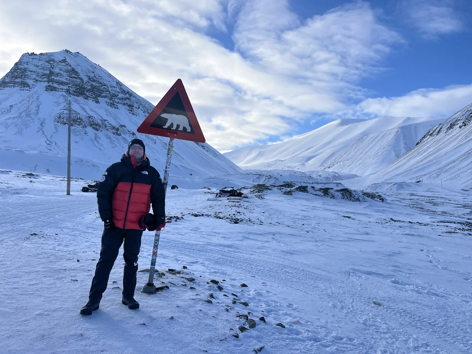 Standing at the polar bear warning sign where the road out of Longyearbyen ends